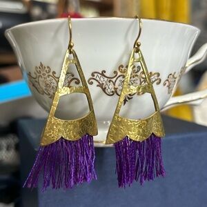 Gold metal and purple string dangle earrings